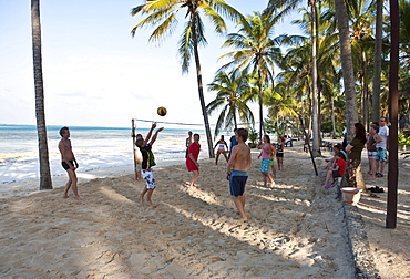 Young people playing beach volleyball, Kaarafu Beach, Zanzibar, Tanzania, Africa