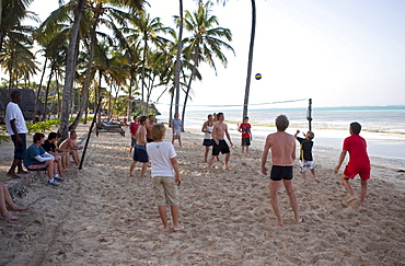 Young people playing beach volleyball, Kaarafu Beach, Zanzibar, Tanzania, Africa