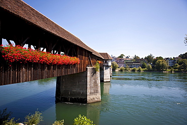 Old covered wooden bridge dating from the 15th Century over the Rhine River, Bad Saeckingen, Waldshut district, Baden-Wuerttemberg, Germany, Europe