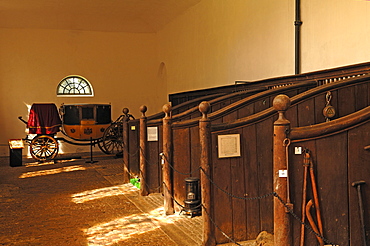 Stable of ""Boughton House, in the back a dress coach, carriage for special occasions, from 1830, Geddington, Kettering, Northamptonshire, England, United Kingdom, Europe