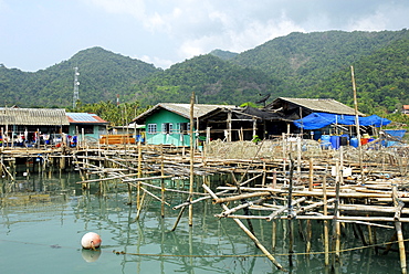 Pier with housing in the Bang Bao bay, Koh Chang Island, National Park Mu Ko Chang, Trat, Gulf of Thailand, Thailand, Asia