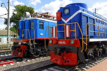 Two Soviet diesel and electric locomotives as exhibits of the Moscow Railway Museum, Moscow, Russia