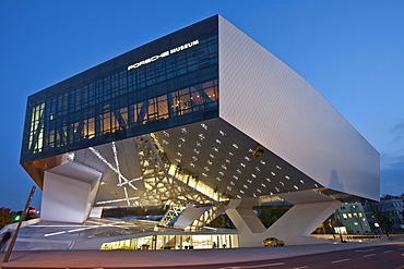 Porsche Museum in Stuttgart-Zuffenhausen, car museum, modern architecture, illuminated in the evening, opening in 2009, Stuttgart, Baden-Wuerttemberg, Germany, Europe