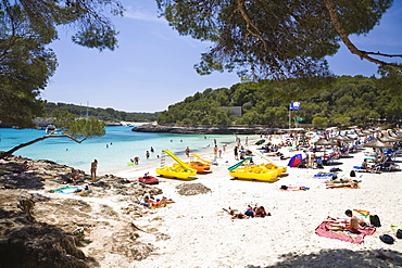 Beach life in the bay Calo d'en Garrot, Cala Mondrago, Mondrago nature reserve, Mallorca, Majorca, Balearic Islands, Mediterranean Sea, Spain, Europe