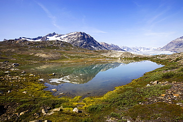 Mountain lake with reflection, Sermiligaq Fjord, Ammassalik District, East Greenland, Greenland, Denmark