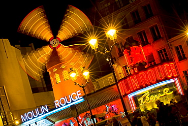 Moulin Rouge, illuminated at night, Paris, France, Europe