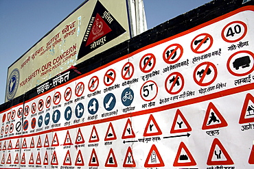 A table with hand-drawn Indian traffic signs on a street in the city of Jodhpur, Rajasthan, India, Asia