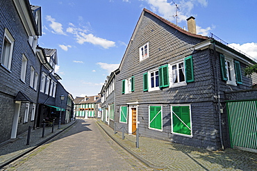 Half-timbered houses, slate cladding, street, historic centre, Hueckeswagen, Bergisches Land area, North Rhine-Westphalia, Germany, Europe