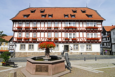 Half-timbered historic Town Hall and fountain on the market square, Wolfhagen, Habichtswald National Park, Hesse, Germany, Europe