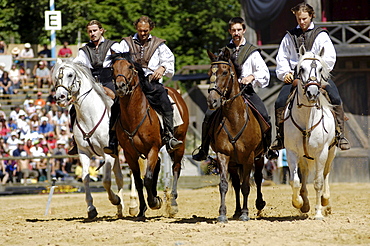 Four horsemen riding horses, Knights' Tournament in Kaltenberg, Upper Bavaria, Bavaria, Germany, Europe