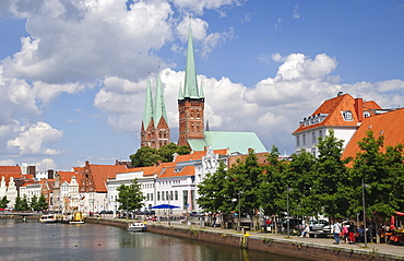 At the upper Trave river, in the back the churches of St. Petri and Marienkirche, St. Mary's of Luebeck, Luebeck, Schleswig-Holstein, Germany, Europe