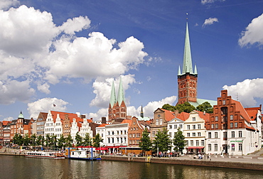 At the upper Trave river, in the back the churches of St. Petri and Marienkirche, St. Mary's of Luebeck, Luebeck, Schleswig-Holstein, Germany, Europe