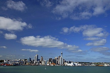 Blue sky and clouds over the skyline of Auckland, New Zealand