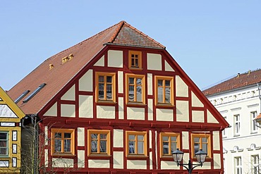 Restored timbered house, market square, Waren, Mecklenburg-Western Pomerania, Germany, Europe