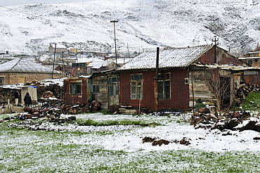 Poor Yezidi village near Mount Aragats covered in snow, Armenia, Asia