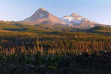 North and Middle Sister volcanoes at McKenzie Pass, Cascade Range, Oregon, USA