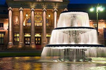 Bowling Green, fountain at night, dusk, Kurhaus, historic spa hotel and convention center, Wiesbaden, Hesse, Germany