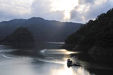 Reservoir of the La Miel hydroelectric power plant at sunset, Caldas, Colombia, South America