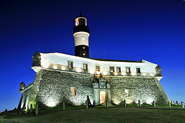 Forte de Santo Antonio da Barra fortress with Farol da Barra lighthouse at night, Salvador, Bahia, UNESCO World Heritage Site, Brazil, South America