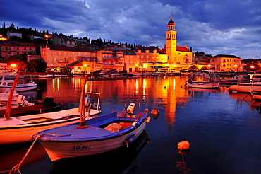 Fishing boats in the harbor of Sutivan in front of the church Sveti Ivan, Island Brac, Dalmatia, Croatia, Balkans, Europe