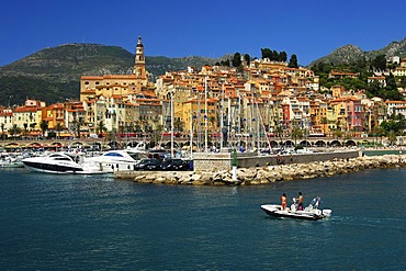 Zodiac boat returning to the old port of Menton, Cote d'Azur, France