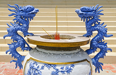 Two blue dragons on a Buddhist incense bowl, Mui Ne, Vietnam, Asia