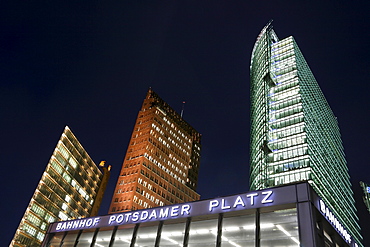 High-rise buildings, Debis, Kolhoff and DB Tower skyscrapers and entrance to the S-Bahn train station at Potsdamer Platz, in Berlin, Germany, Europe