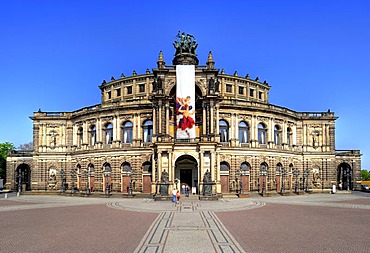 Semperoper Opera house with flags, Theaterplatz square, Dresden, Free State of Saxony, Germany, Europe