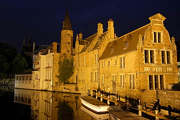 Water reflection on River Dijver at dusk, Bruges, Flanders, Belgium, Europe