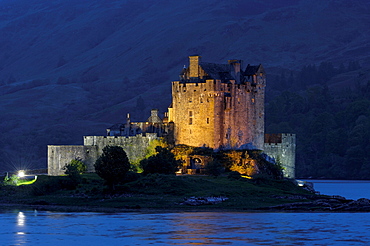 Eilean Donan castle and Loch Duich at dusk, Highlands Region, Scotland, United Kingdom, Europe