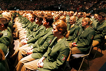 Swearing in of 1100 new police officers in the Koeln Arena stadium, Cologne, North Rhine-Westphalia, Germany, Europe