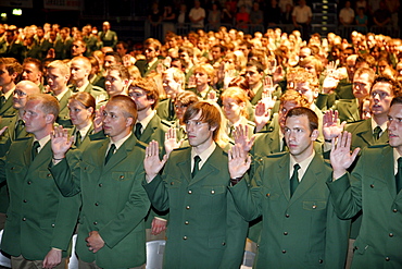 Swearing in of 1100 new police officers in the Koeln Arena stadium, Cologne, North Rhine-Westphalia, Germany, Europe