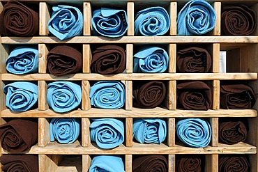 Wooden shelf with rolled blankets for guests feeling cold, terrace of a beach restaurant, Bergen aan Zee, Holland, Netherlands, Europe