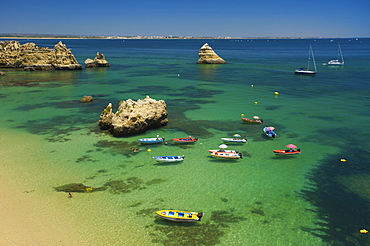 Excursion boats at Praia Dona Ana, Algarve, Portugal, Europe