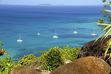 Sailing boats in front of the Anse Volbert, Cote d'Or, Praslin Island, Seychelles, Africa, Indian Ocean