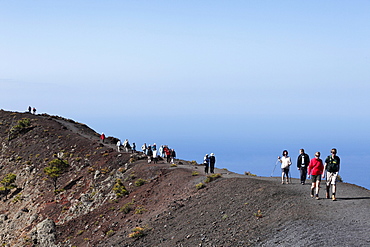 Tourists on the crater rim of the volcano Fuencaliente at San Antonio, La Palma, Canary Islands, Spain, Europe