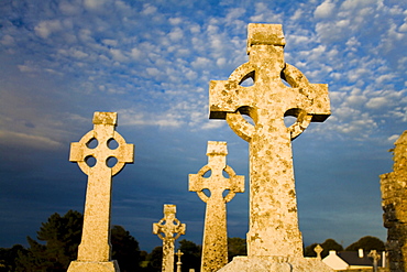 High crosses in the evening light in the monastery of Clonmacnoise, County Offaly, Leinster, Ireland, Europe