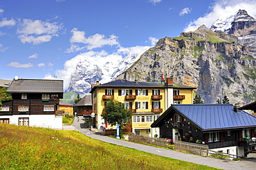 The traditional and car-free mountain village of Muerren in the Bernese Oberland, the Eiger in the back, Canton Bern, Switzerland, Europe