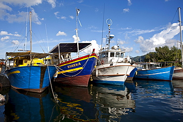 Fishing boats in the harbor of Victoria, Mahe Island, Seychelles, Indian Ocean, Africa