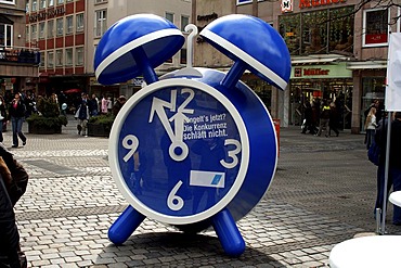 Blue alarm clock as an advertisement on the street, Nuremberg, Middle Franconia, Bavaria, Germany, Europe