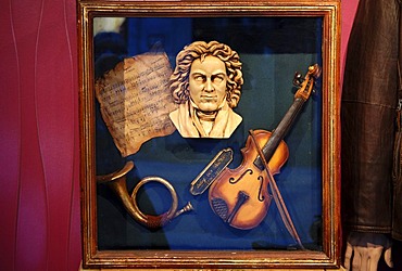 Bust of Beethoven and instruments in a golden frame, Bruges, Belgium, Europe