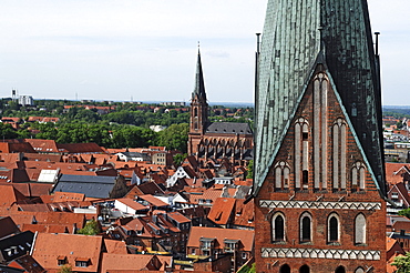 View from the water tower on the Old Town, St. Johannis church in the front, in the back the St. Nikolai church, Lueneburg, Lower Saxony, Germany, Europe