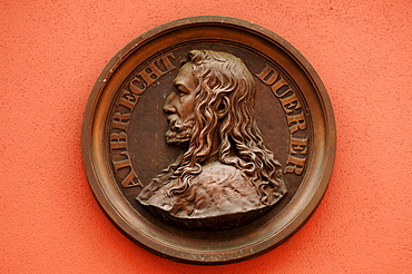 Plaque with a portrait of Albrecht Duerer on a house facade, Nuremberg, Middle Franconia, Bavaria, Germany, Europe