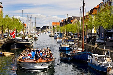 Tour boat in Christianshavns Canal, Copenhagen, Denmark