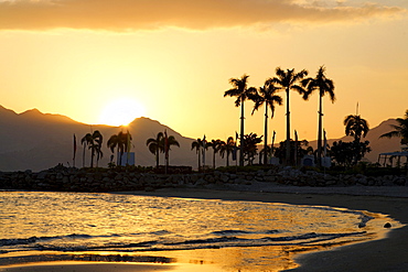 Beach in the evening, lighthouse, mountains, palm trees, romantic mood, Olongapo City, Subic Bay, Luzon island, Philippines, South China Sea, Pacific Ocean