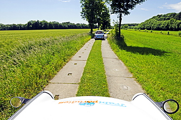 Trabi cars on the stone path of the GDR at the former inner-German border, Thuringia, Germany, Europe