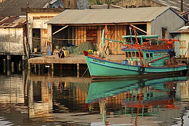 Fishing boat with reflection in the harbour of Duong Dong, Phu Quoc island, Vietnam, Asia