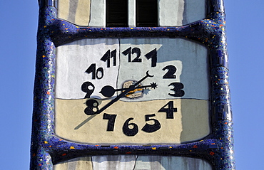 Detail of the clock at St. Barbara-Kirche, Church of Saint Barbara, renovated by Friedensreich Hundertwasser, in Baernbach, Styria, Austria, Europe