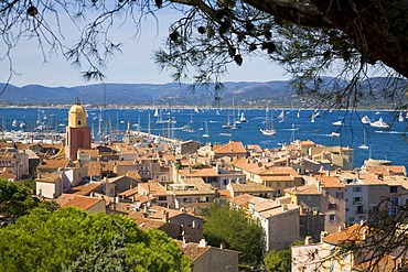 View over the roofs on the bay of Saint-Tropez during the sailing regatta "Les Voiles de Saint-Tropez" in Saint-Tropez, Departement Var, Cote d'Azur, Provence, Southern France, France