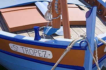 A boat called "Saint-Tropez" in the harbour of Saint-Tropez, Departement Var, Cote d'Azur, Provence, Southern France, France